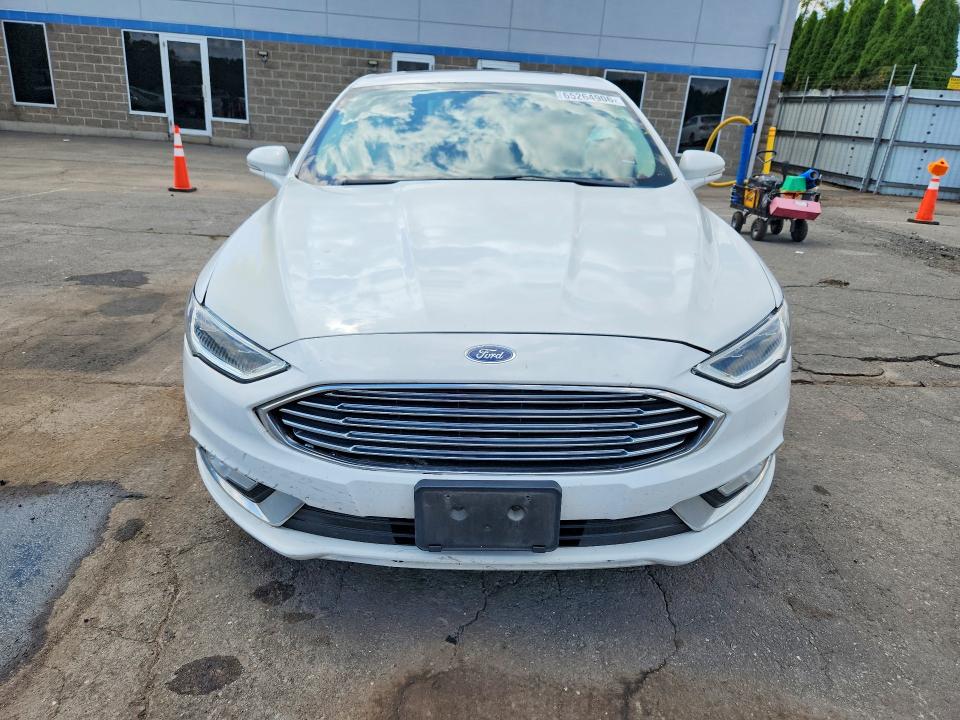 Photo 5 from auction – 2017 FORD FUSION with VIN 3FA6P0K90HR115250