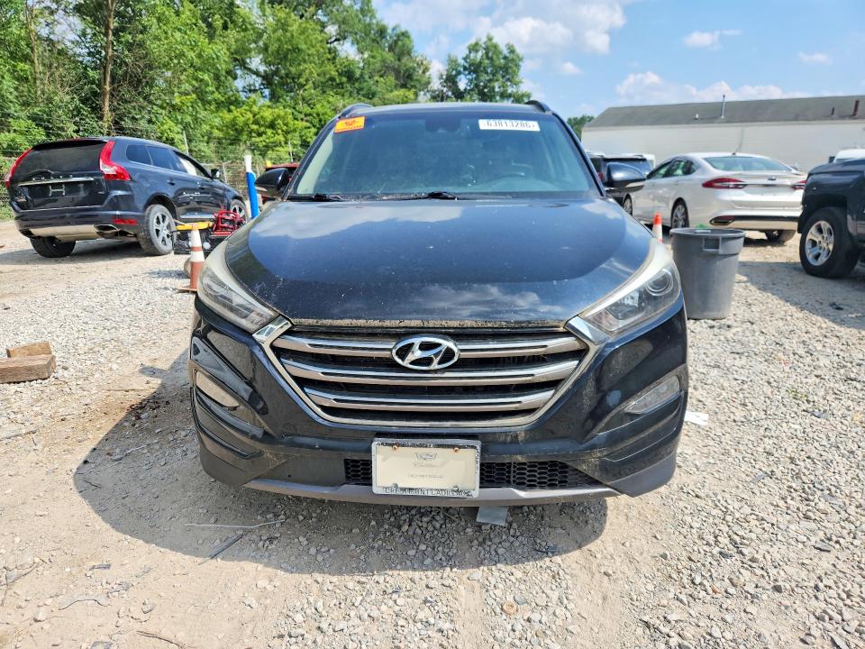Photo 5 from auction – 2016 HYUNDAI TUCSON with VIN KM8J3CA21GU201305