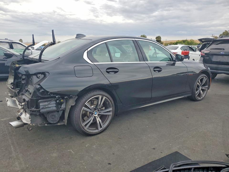 Photo 3 from auction – 2021 BMW 330I with VIN 3MW5R1J03M8C09550