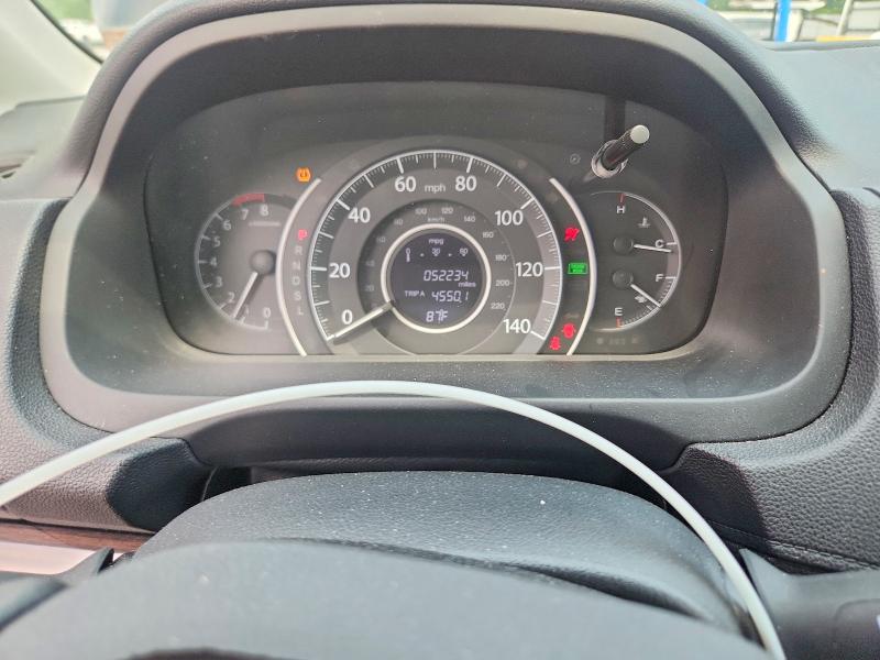 Photo 9 from auction – 2015 HONDA CR-V with VIN 2HKRM4H75FH667663