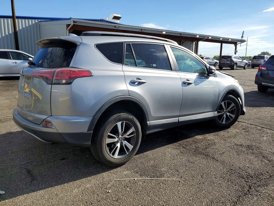 Photo 3 from auction – 2018 TOYOTA RAV4 with VIN 2T3WFREV2JW461974