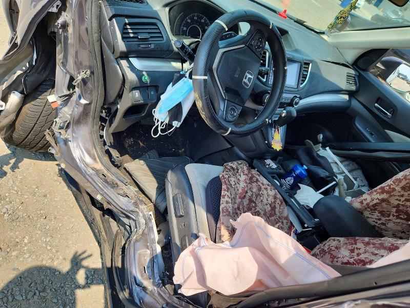 Photo 8 from auction – 2016 HONDA CR-V with VIN 3CZRM3H55GG716082