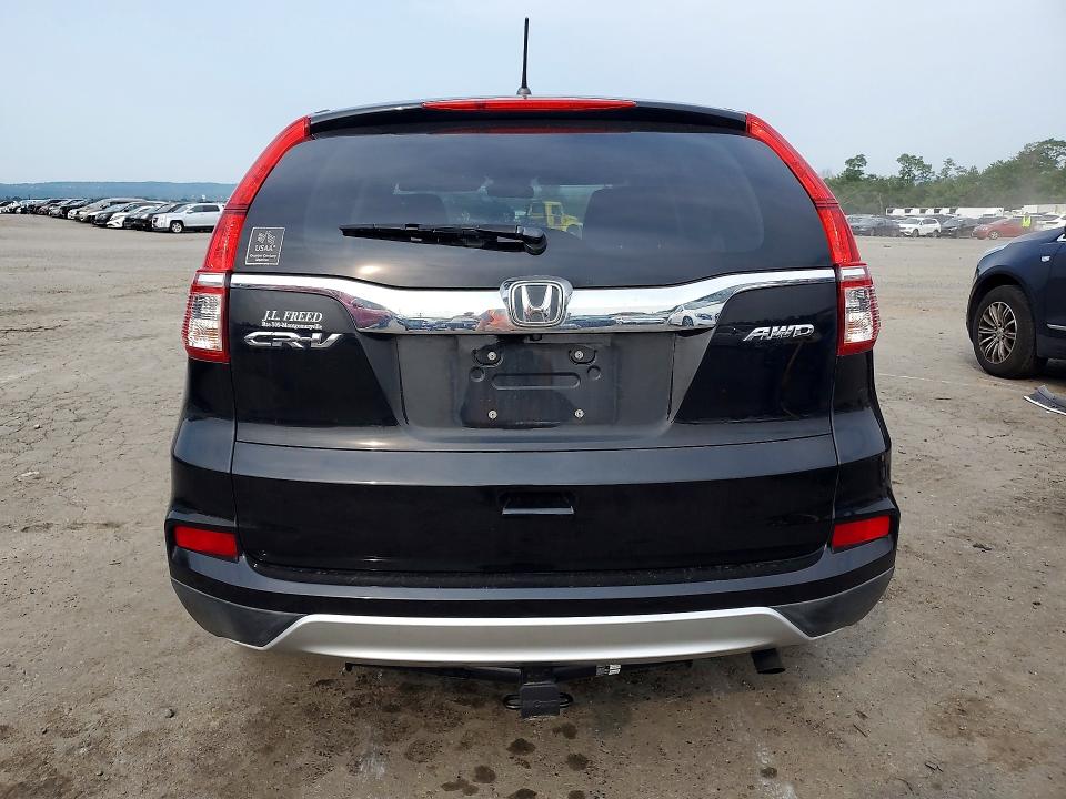 Photo 6 from auction – 2015 HONDA CR-V with VIN 2HKRM4H57FH683796