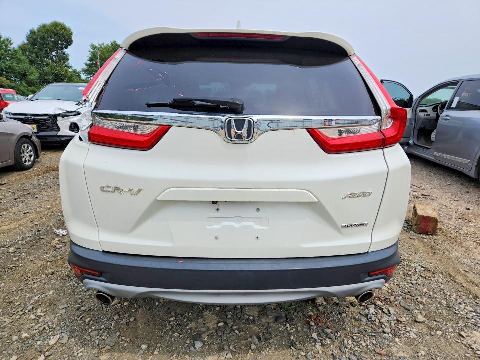 Photo 6 from auction – 2017 HONDA CR-V with VIN 2HKRW2H92HH606757