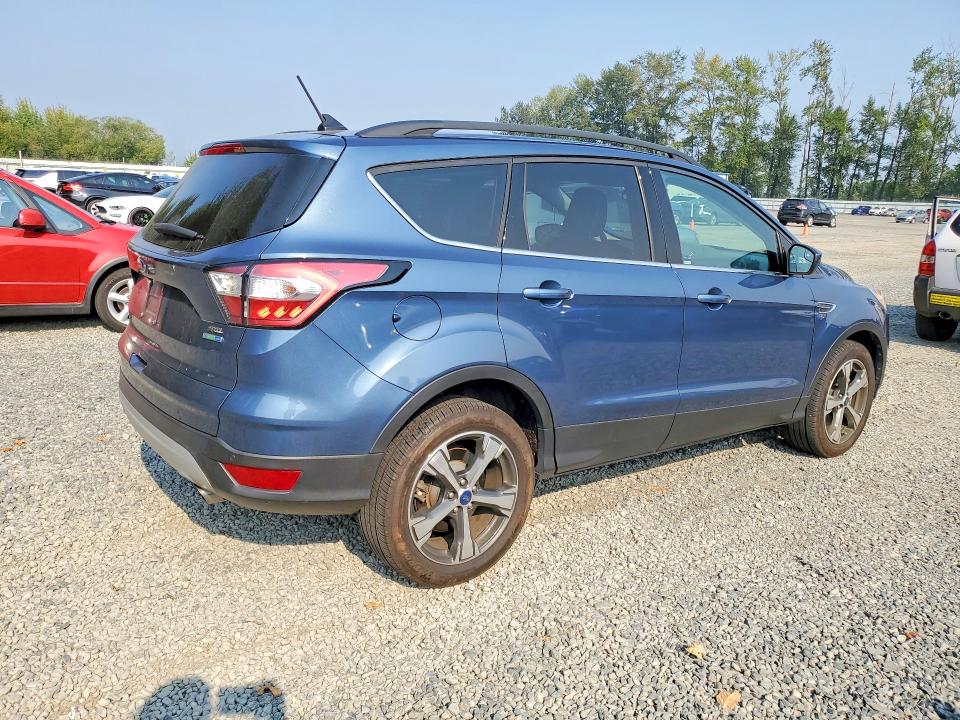 Foto 3 de la subasta – 2018 FORD ESCAPE con VIN 1FMCU9HD1JUB44885