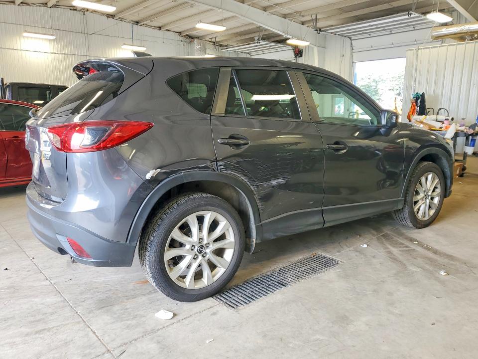 Photo 3 from auction – 2014 MAZDA CX-5 with VIN JM3KE4DY4E0348495