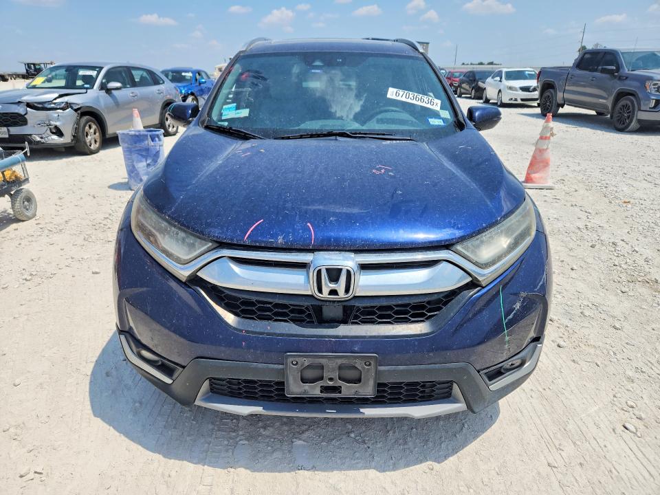Photo 5 from auction – 2017 HONDA CR-V with VIN 7FARW1H99HE028427