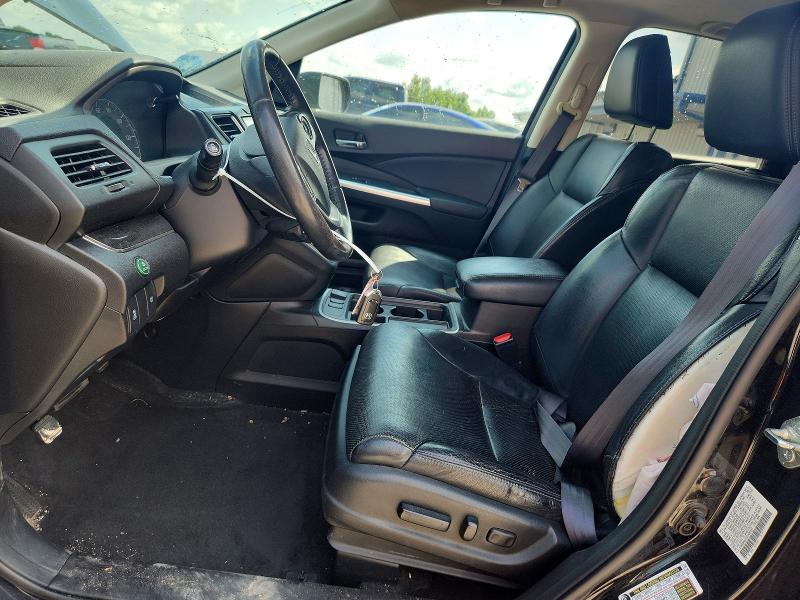 Photo 7 from auction – 2016 HONDA CR-V with VIN 2HKRM4H76GH695392