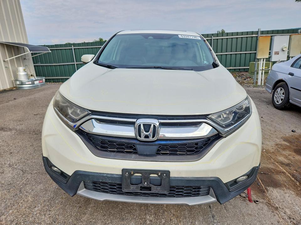 Photo 5 from auction – 2018 HONDA CR-V with VIN 2HKRW2H86JH635353