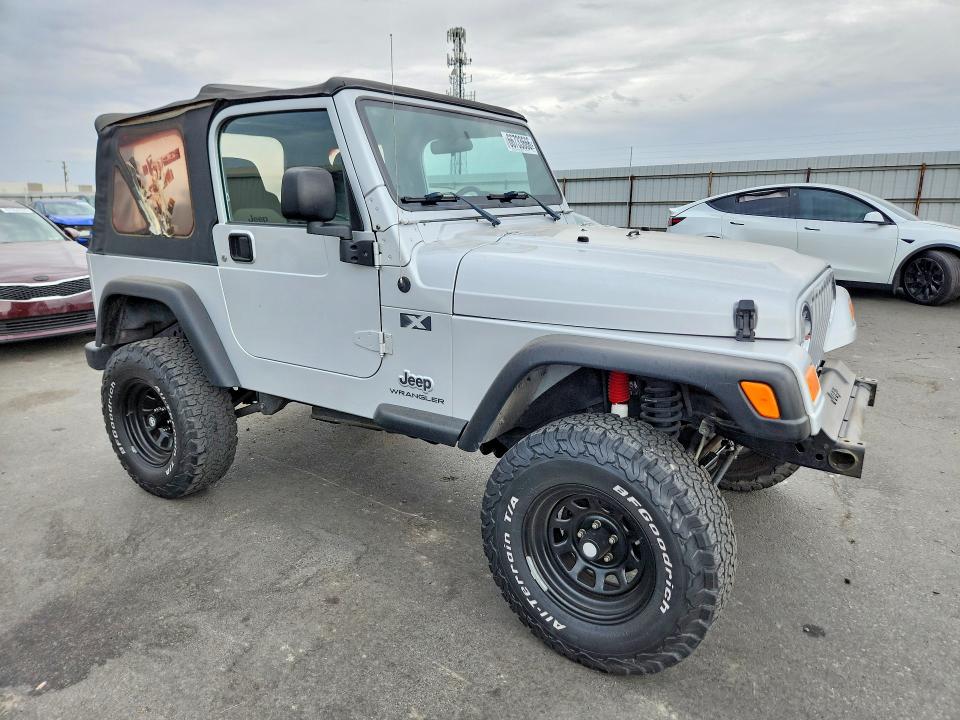 Photo 4 from auction – 2004 JEEP WRANGLER with VIN 1J4FA39S04P746081