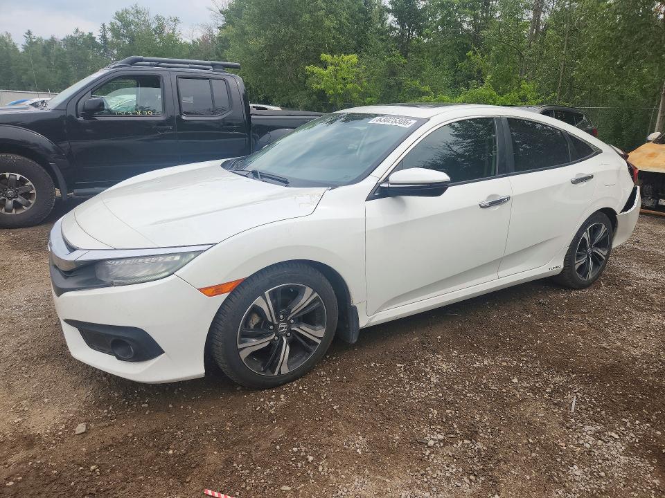 HONDA CIVIC 2017 with VIN 2HGFC1F9XHH104856 - Photo from auction