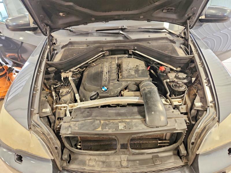 Photo 12 from auction – 2012 BMW X5 with VIN 5UXZV4C57CL753842