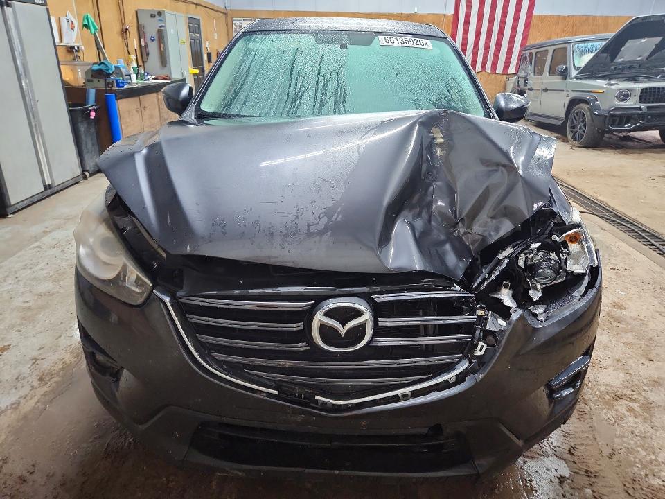 Photo 5 from auction – 2016 MAZDA CX-5 with VIN JM3KE4CY6G0718429