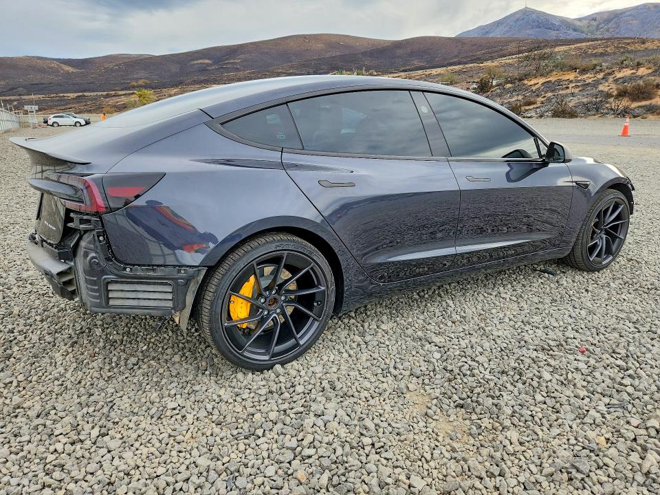 Снимка 3 от търг – 2024 TESLA MODEL 3 с VIN 5YJ3E1EB5RF806896