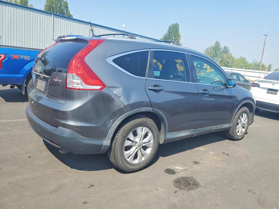 Photo 3 from auction – 2014 HONDA CR-V with VIN 2HKRM4H76EH667430