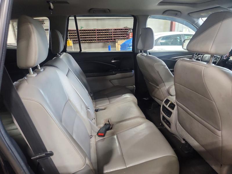 Photo 11 from auction – 2016 HONDA PILOT with VIN 5FNYF6H74GB048652