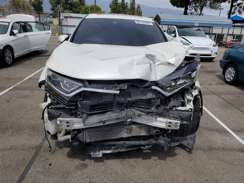 Photo 5 from auction – 2018 HONDA CR-V with VIN 2HKRW1H85JH516753