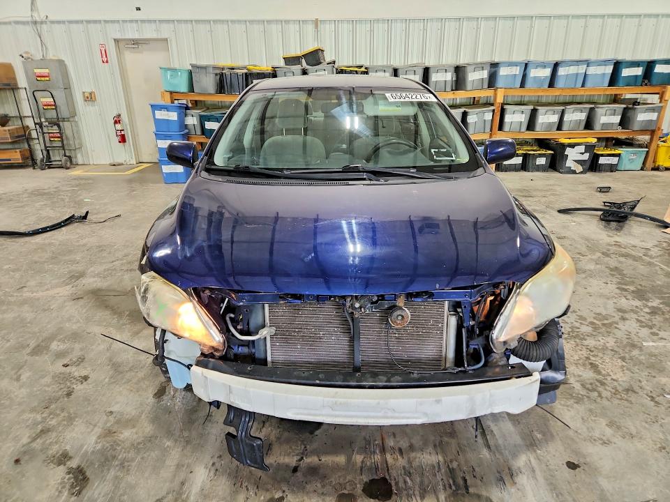 Photo 5 from auction – 2012 TOYOTA COROLLA with VIN JTDBU4EE1C9173972