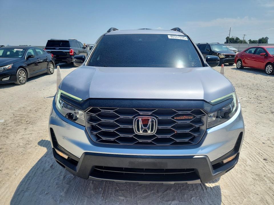 Photo 5 from auction – 2022 HONDA PASSPORT with VIN 5FNYF8H66NB002448