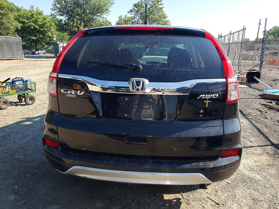 Photo 6 from auction – 2016 HONDA CR-V with VIN 2HKRM4H51GH688929