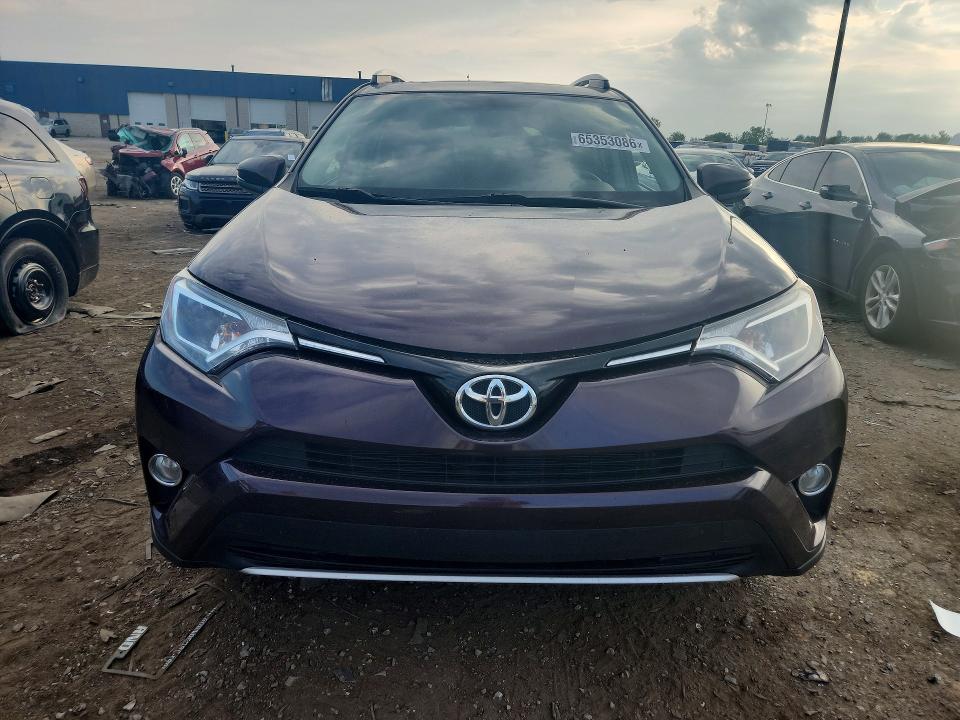 Photo 5 from auction – 2016 TOYOTA RAV4 with VIN 2T3RFREV7GW453892