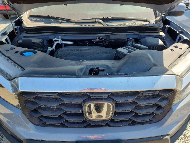 Photo 12 from auction – 2023 HONDA PASSPORT with VIN 5FNYF8H58PB038569