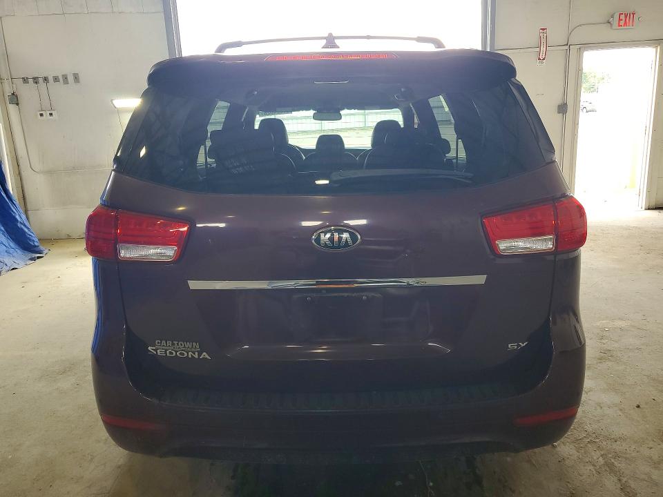 Photo 6 from auction – 2015 KIA SEDONA with VIN KNDMC5C12F6037843