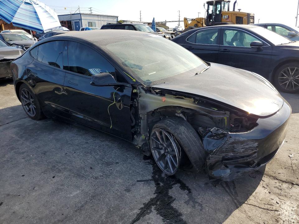 Photo 4 from auction – 2021 TESLA MODEL 3 with VIN 5YJ3E1EA0MF986787