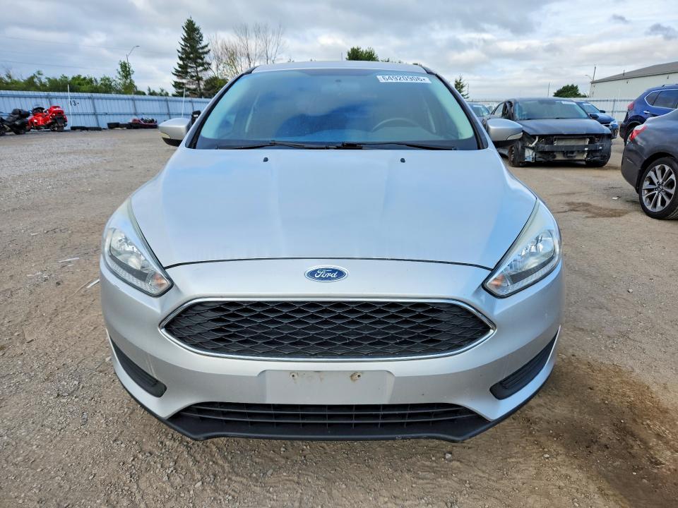 Photo 5 from auction – 2016 FORD FOCUS with VIN 1FADP3K20GL353768