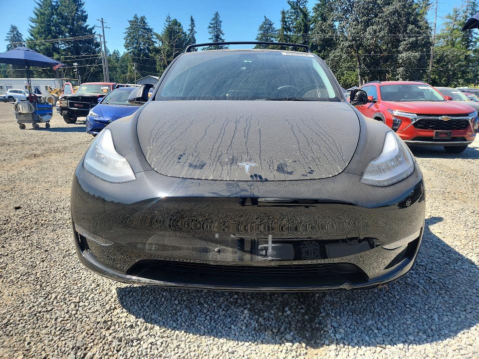 Photo 5 from auction – 2023 TESLA MODEL Y with VIN 7SAYGDEE0PA105031