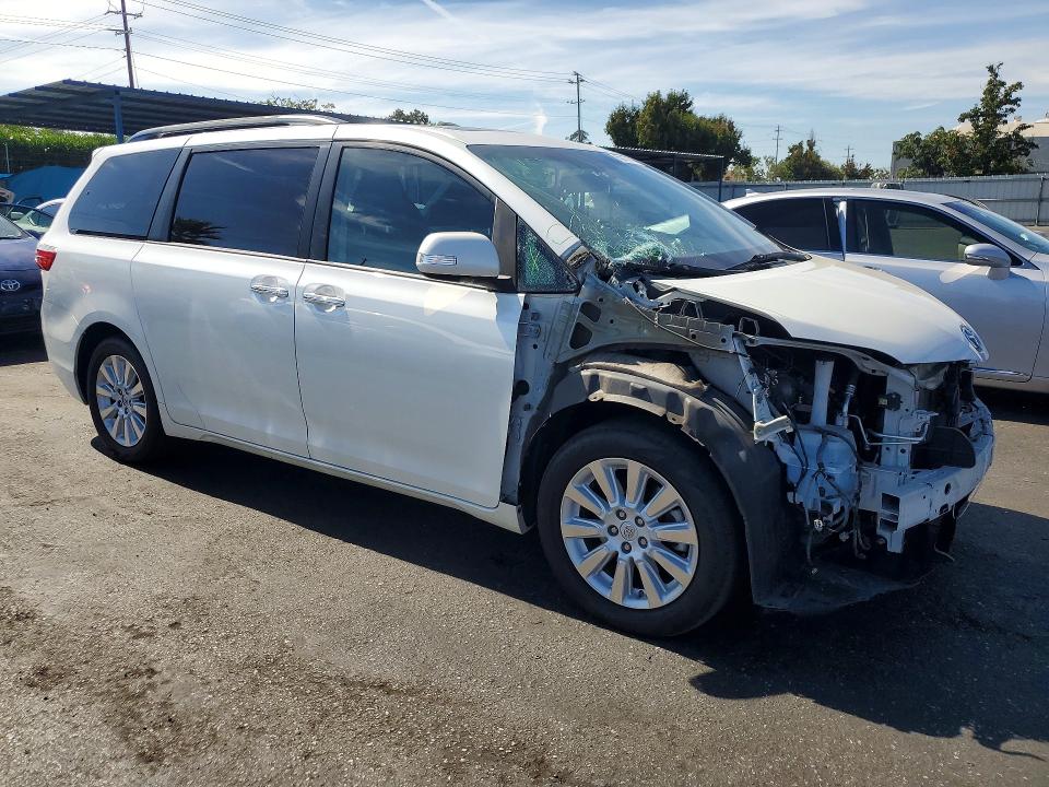 Photo 4 from auction – 2015 TOYOTA SIENNA with VIN 5TDDK3DC0FS115009
