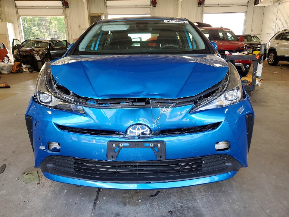 Photo 5 from auction – 2021 TOYOTA PRIUS with VIN JTDKAMFU5M3131338