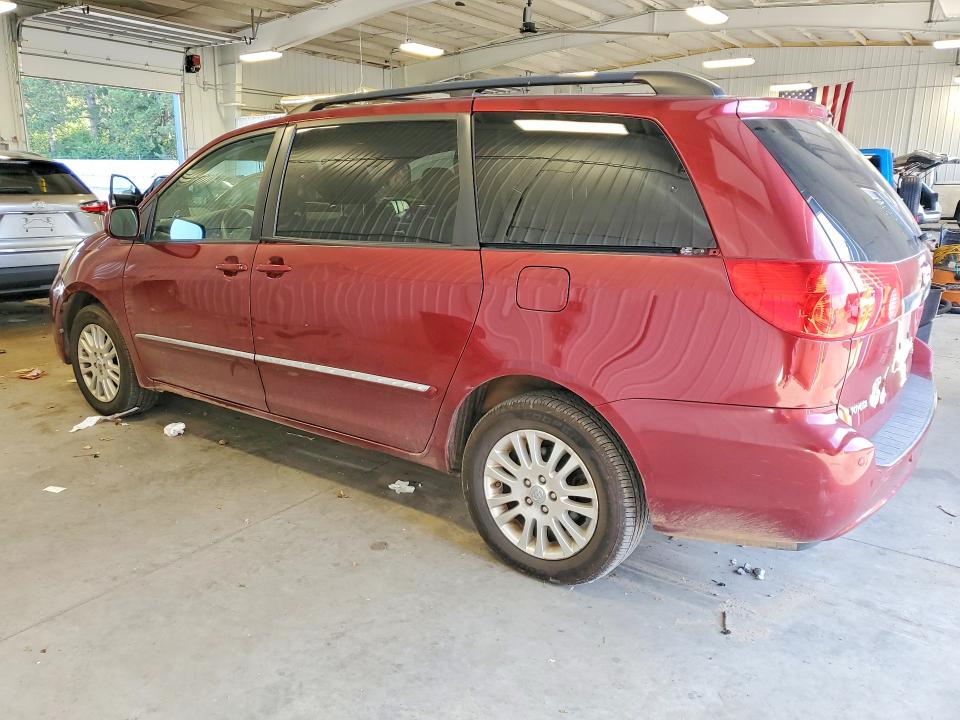 Photo 2 from auction – 2010 TOYOTA SIENNA with VIN 5TDDK4CC9AS031089