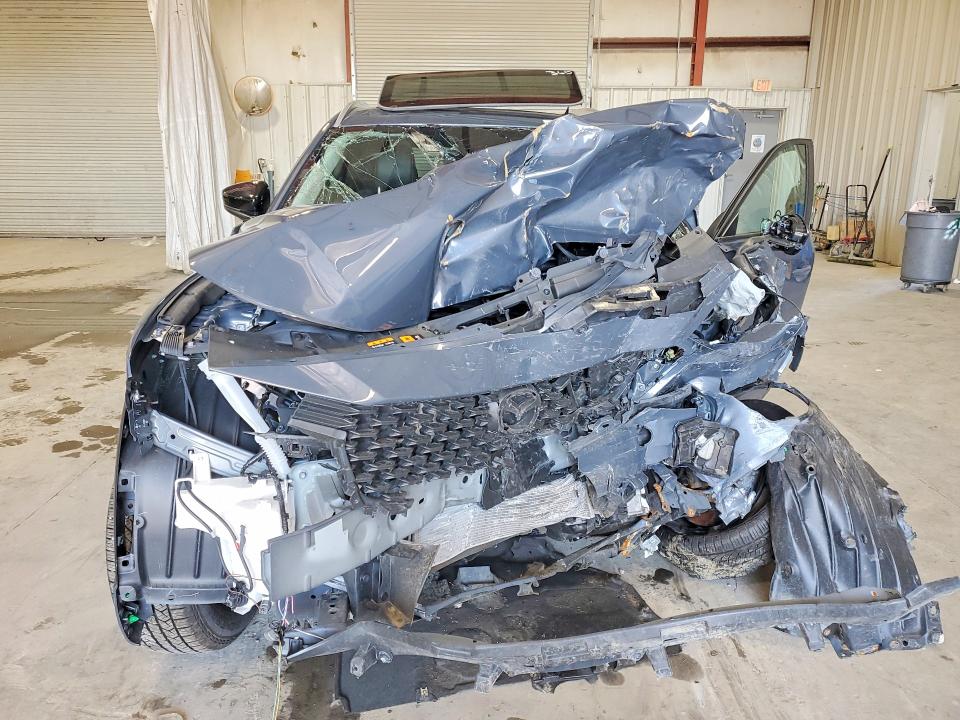 Photo 5 from auction – 2024 MAZDA CX-50 with VIN 7MMVABDM3RN172275