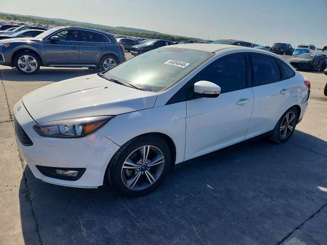 FORD FOCUS 2016 with VIN 1FADP3FE1GL378943 - Photo from auction