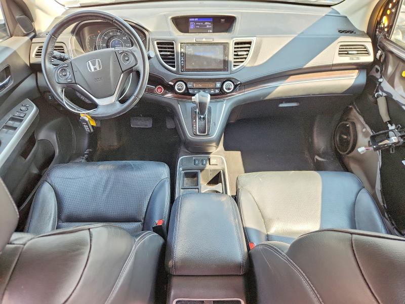 Photo 8 from auction – 2015 HONDA CR-V with VIN 2HKRM3H70FH540748