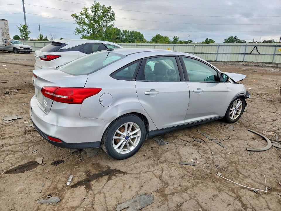 Photo 3 from auction – 2016 FORD FOCUS with VIN 1FADP3F24GL359292