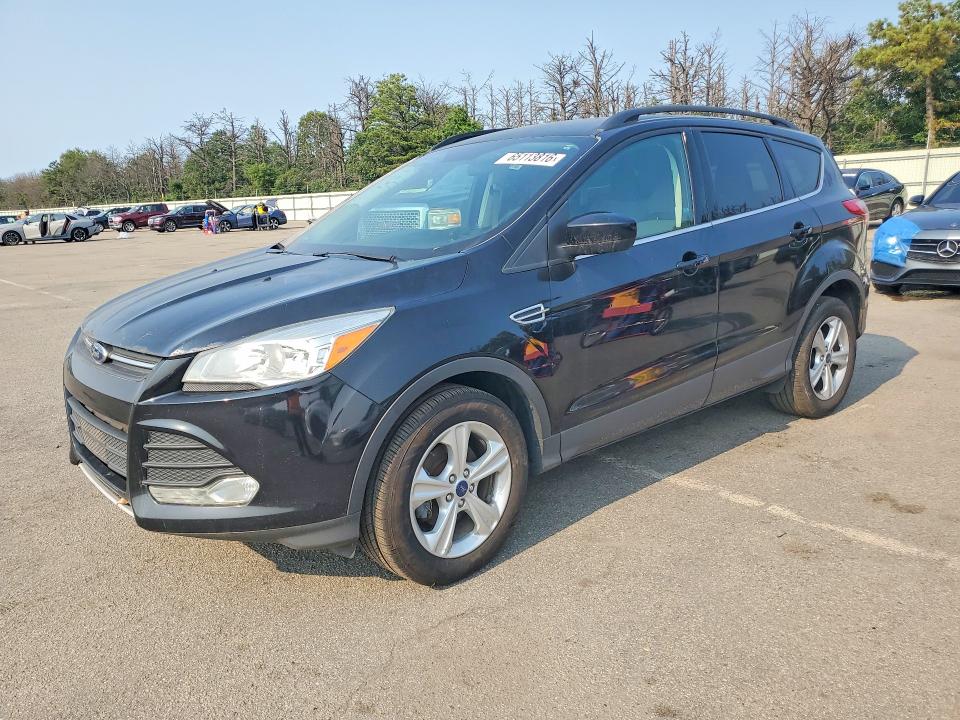 FORD ESCAPE 2016 with VIN 1FMCU0GX8GUA63981 - Photo from auction