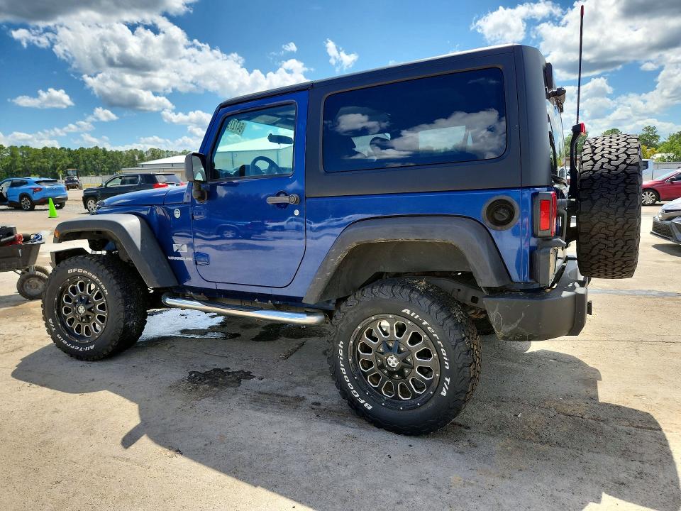 Photo 2 from auction – 2009 JEEP WRANGLER with VIN 1J4FA24199L762772