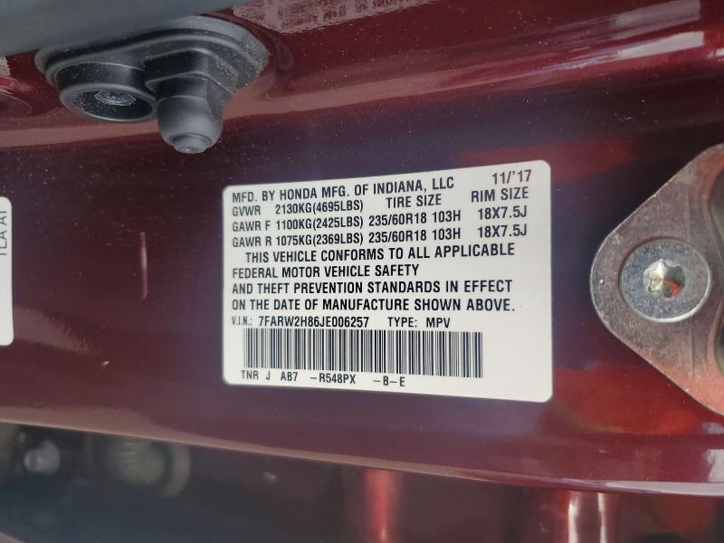 Photo 14 from auction – 2018 HONDA CR-V with VIN 7FARW2H86JE006257