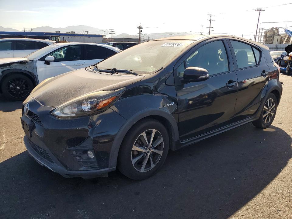 TOYOTA PRIUS C 2018 with VIN JTDKDTB39J1605409 - Photo from auction