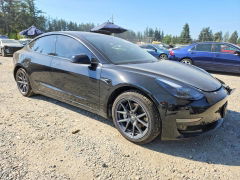 Foto 4 de la subasta – 2021 TESLA MODEL 3 con VIN 5YJ3E1EA0MF908347