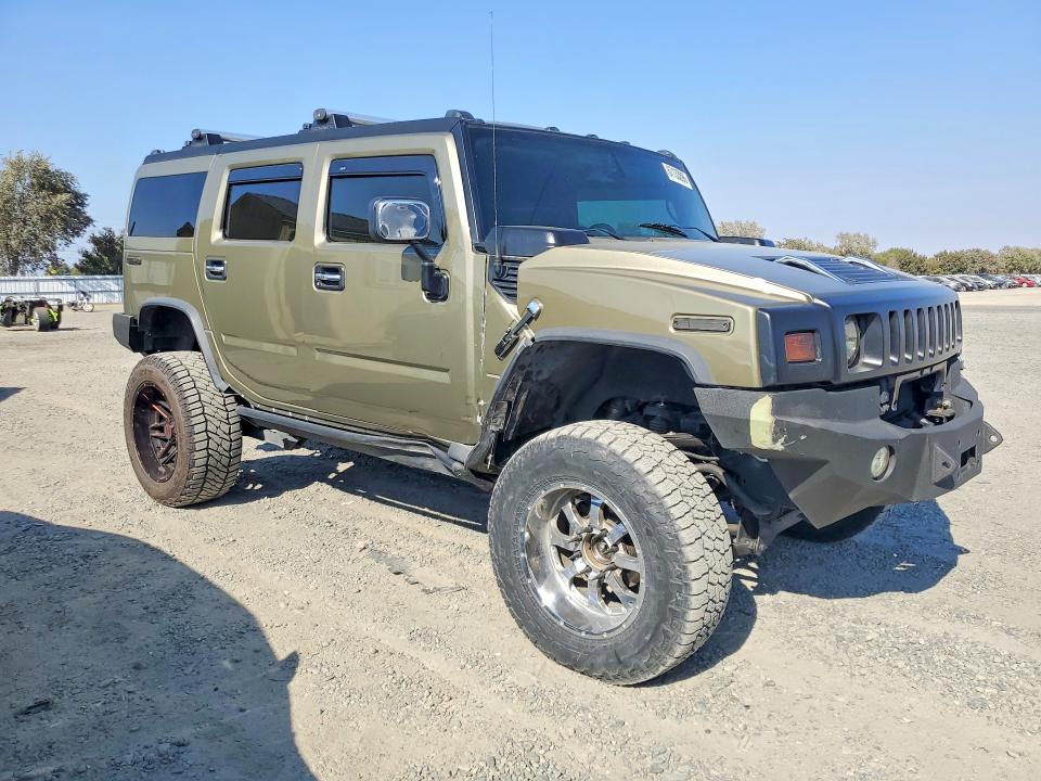 Фото 4 с аукциона – 2005 HUMMER H2 с VIN 5GRGN23U25H104734