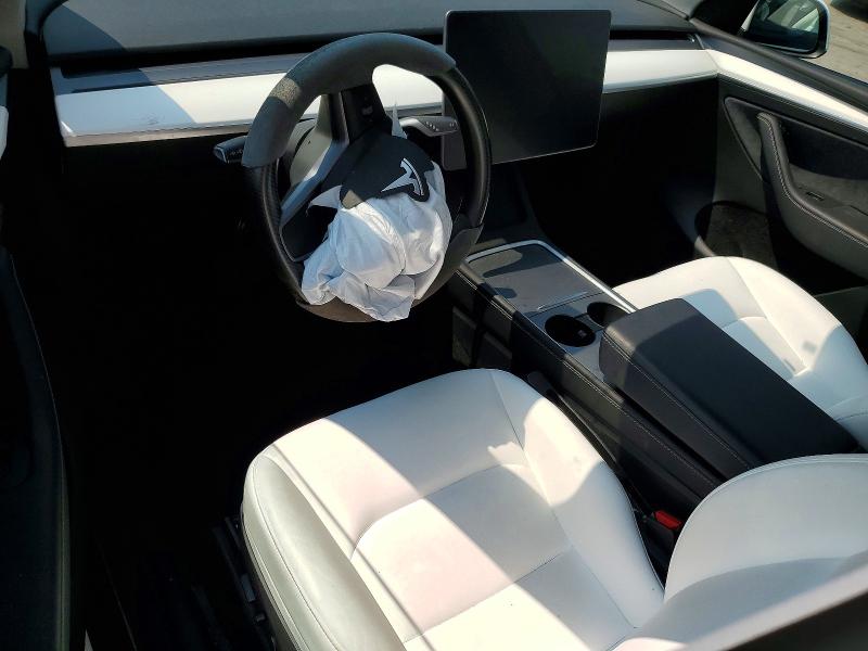 Photo 8 from auction – 2025 TESLA MODEL Y with VIN 7SAYGAEE7SF288311