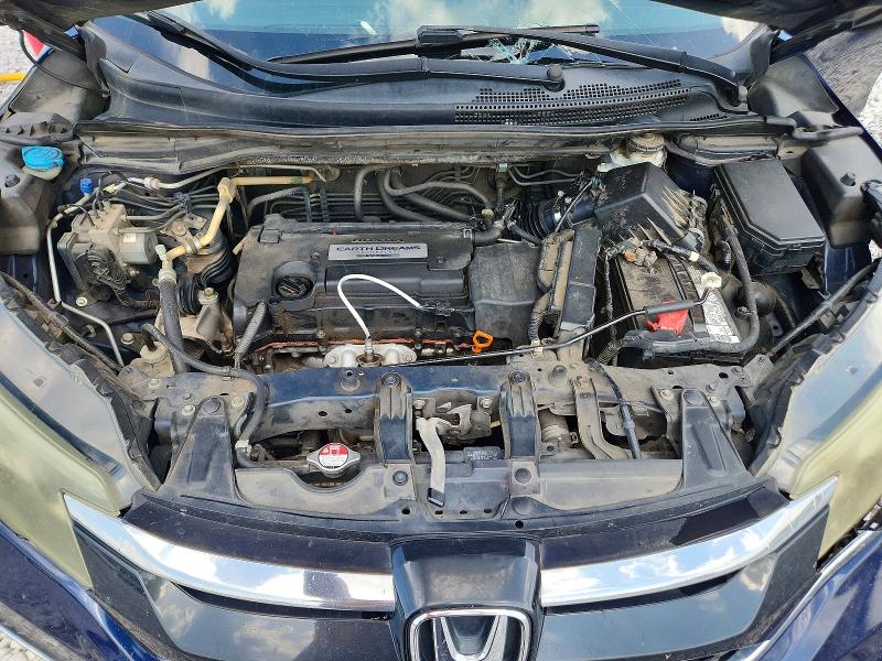 Photo 12 from auction – 2015 HONDA CR-V with VIN 2HKRM3H55FH531722