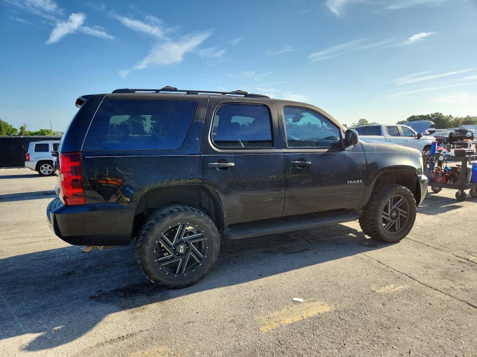 Photo 3 from auction – 2014 CHEVROLET TAHOE with VIN 1GNSCBE00ER196097