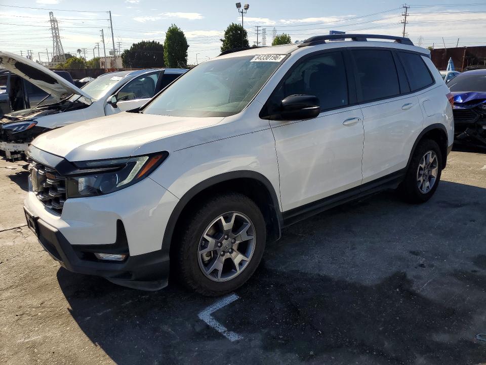 HONDA PASSPORT 2022 with VIN 5FNYF8H6XNB024792 - Photo from auction