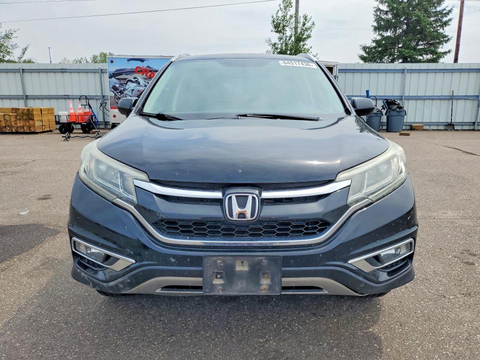 Photo 5 from auction – 2015 HONDA CR-V with VIN 5J6RM4H75FL078182