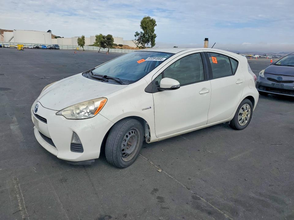 TOYOTA PRIUS C 2014 with VIN JTDKDTB37E1566776 - Photo from auction