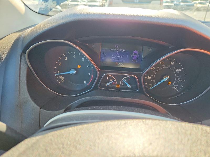 Photo 9 from auction – 2015 FORD FOCUS with VIN 1FADP3E24FL253229